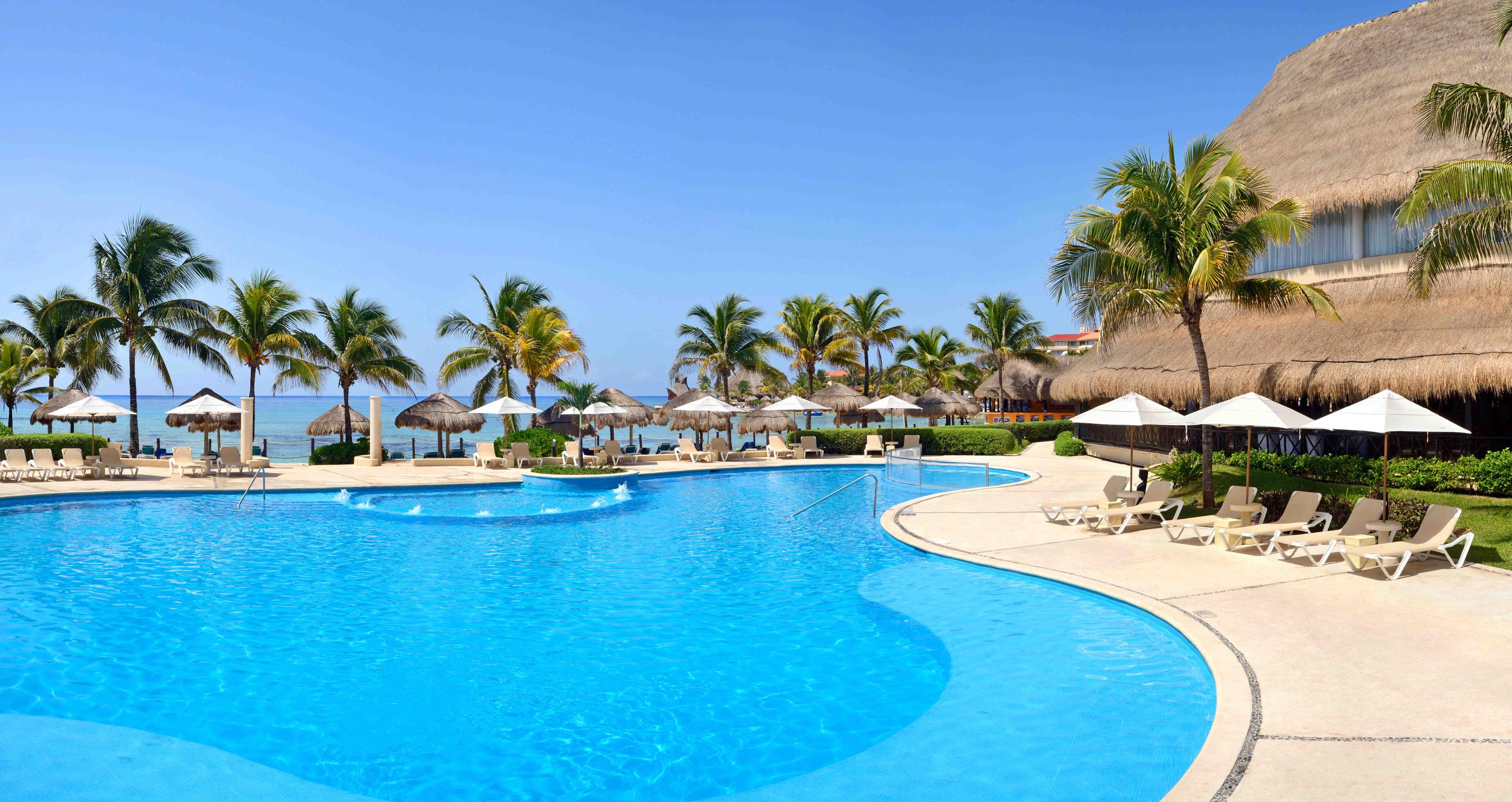 Catalonia Riviera Maya Resort & Spa Puerto Aventuras Exterior photo Pool at Iberostar Grand Hotel Bávaro